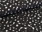 Preview: Baumwolljersey Weiße Farbkleckse auf Schwarz 35 x 150 cm